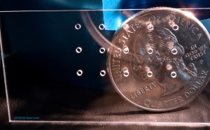 Small Holes in Glass