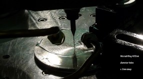 400um diameter holes x 2mm deep
