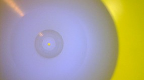 200 micron hole in Delrin.  Potomac utilizes the latest technology to drill small holes in almost material.  Contact us today to discuss your prototyping or production hole drilling project.